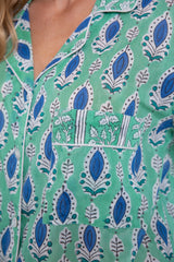 Pijama plumas verdes